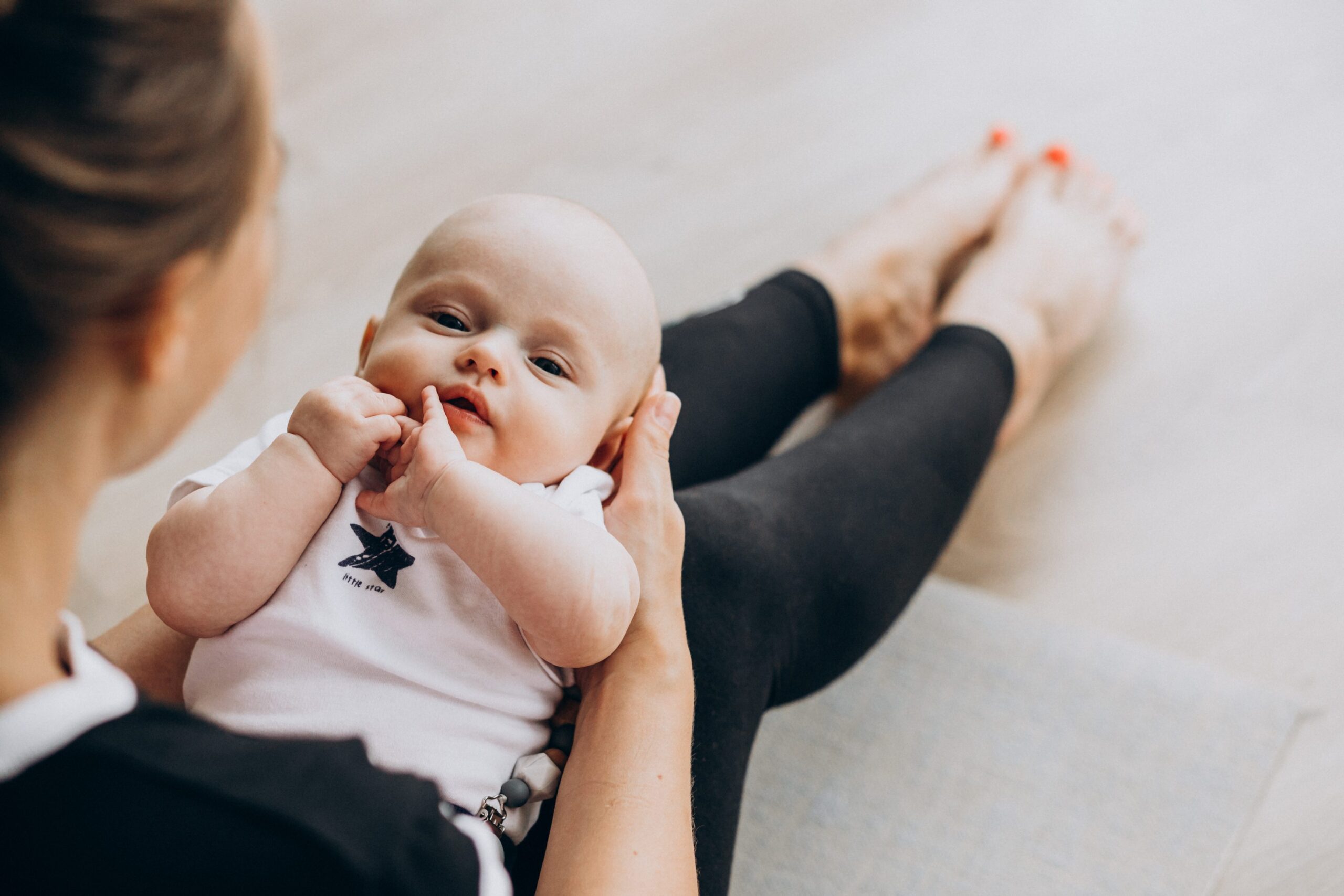 woman-with-baby-boy-practice-yoga-scaled-1-1
